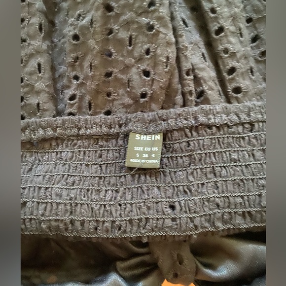 Eyelet Peplum Top - Picture 2 of 3